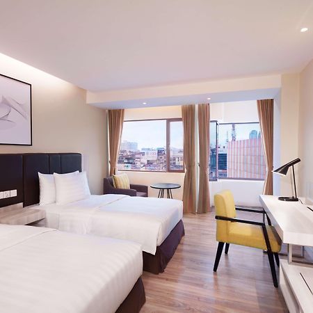 Aiho Hotel Medan Szoba fotó