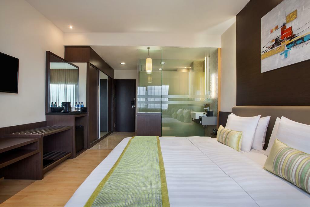 Aiho Hotel Medan Szoba fotó